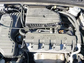 2003 Honda Civic EX with VIN 1HGEM22993L064351, listed as a IAAI auction lot 42182108 with 199,938 mi miles and . Bid and sale history available at carsss.com. Image 10.