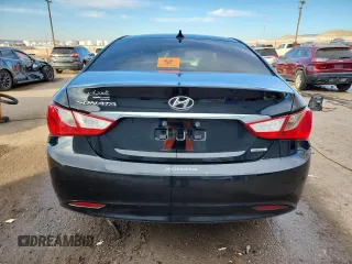 2013 Hyundai Sonata SE z VIN 5NPEC4AC5DH660721, wystawiony jako Copart lot #41617025 z przebiegiem 193 006 mil mil oraz Szkoda całkowita • Salvage title. Historia ofert i sprzedaży dostępna na DreamBid. Obrazek 6.