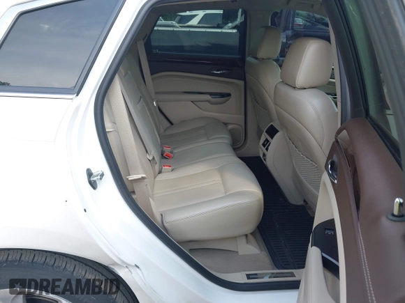 2014 Cadillac SRX Performance Collection with VIN 3GYFNFE34ES677712, listed as a IAAI auction lot 42668059 with 150,135 mi miles and . Bid and sale history available at DreamBid. Image 8.
