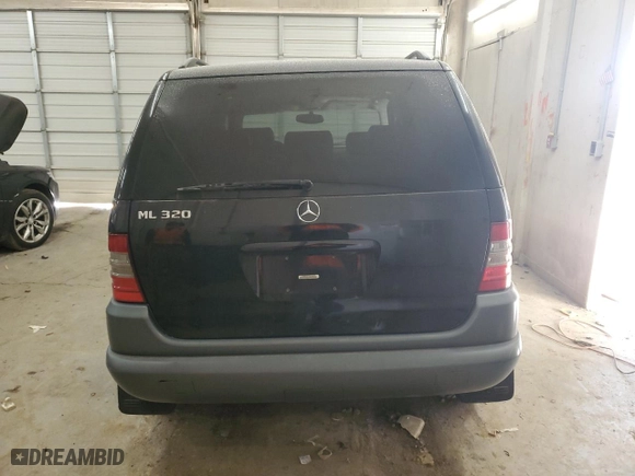 1999 Mercedes-Benz M-Class with VIN 4JGAB54E7XA136885, listed as a Copart auction lot 42031775 with 173,079 mi miles and Salvage Title. Bid and sale history available at carsss.com. Image 6.