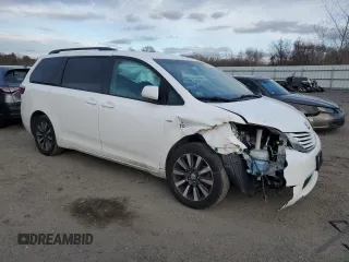 2017 Toyota Sienna LE with VIN 5TDJZ3DCXHS180970, listed as a Copart auction lot 88876535 with 180,318 mi miles and Salvage Title. Bid and sale history available at carsss.com. Image 4.