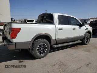 2017 Nissan Titan SL z VIN 1N6AA1E53HN508809, wystawiony jako Copart lot #47577705 z przebiegiem 50 888 mil mil oraz Szkoda całkowita • Salvage title. Historia ofert i sprzedaży dostępna na DreamBid. Obrazek 3.