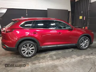 2023 Mazda CX-9 Signature z VIN JM3TCBEY4P0634153, wystawiony jako IAAI lot #42132856 z przebiegiem 25 131 mil mil oraz . Historia ofert i sprzedaży dostępna na DreamBid. Obrazek 13.