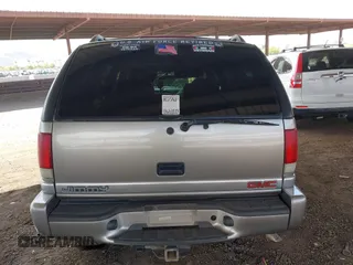 2001 GMC Jimmy SL with VIN 1GKCS13WX12222794, listed as a IAAI auction lot 41949569 with 169,961 mi miles. Bid and sale history available at carsss.com. Image 16.