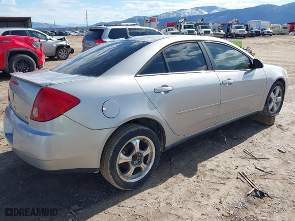 2005 Pontiac G6 GT with VIN 1G2ZH528454152965, listed as a IAAI auction lot 41849100 with 220,177 mi miles. Bid and sale history available at carsss.com. Image 4.