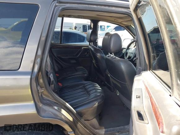2000 Jeep Grand Cherokee Limited с VIN 1J4GW58N8YC241982, выставлен на аукционе IAAI как лот 42481556 с пробегом 179 233 миль миль и . История ставок и продаж доступна на DreamBid. Изображение 8.