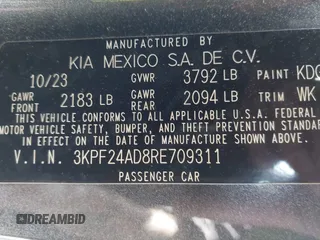 2024 Kia Forte LXS z VIN 3KPF24AD8RE709311, wystawiony jako IAAI lot #42001871 z przebiegiem 22 642 mil mil oraz . Historia ofert i sprzedaży dostępna na DreamBid. Obrazek 9.