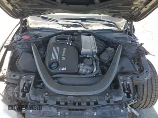 2015 BMW M4 with VIN WBS3R9C50FK333819, listed as a Copart auction lot 61105565 with 168,932 mi miles and Salvage title. Bid and sale history available at DreamBid. Image 11.