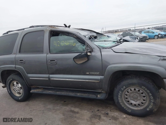2002 Chevrolet Tahoe LT with VIN 1GNEK13Z42J219242, listed as a IAAI auction lot 41208846 with 279,366 mi miles. Bid and sale history available at carsss.com. Image 13.