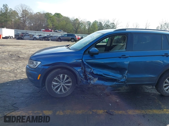 2020 Volkswagen Tiguan S with VIN 3VV1B7AXXLM002683, listed as a IAAI auction lot 41533012 with 108,257 mi miles and . Bid and sale history available at DreamBid. Image 6.