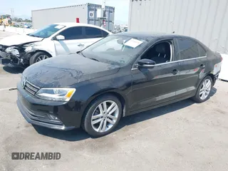 2015 Volkswagen Jetta SEL z VIN 3VWL17AJ7FM307632, wystawiony jako IAAI lot #42766536 z przebiegiem 101 661 mil mil oraz . Historia ofert i sprzedaży dostępna na DreamBid. Obrazek 17.