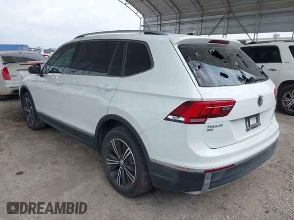2018 Volkswagen Tiguan SEL with VIN 3VV2B7AX8JM120443, listed as a IAAI auction lot 42154773 with 70,256 mi miles and . Bid and sale history available at DreamBid. Image 3.