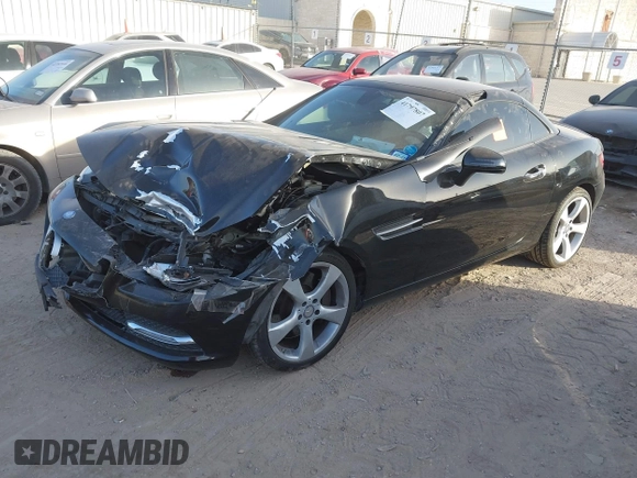 2013 Mercedes-Benz SLK-Class SLK 350 with VIN WDDPK5HA6DF054060, listed as a IAAI auction lot 41797807 with 84,877 mi miles. Bid and sale history available at carsss.com. Image 2.