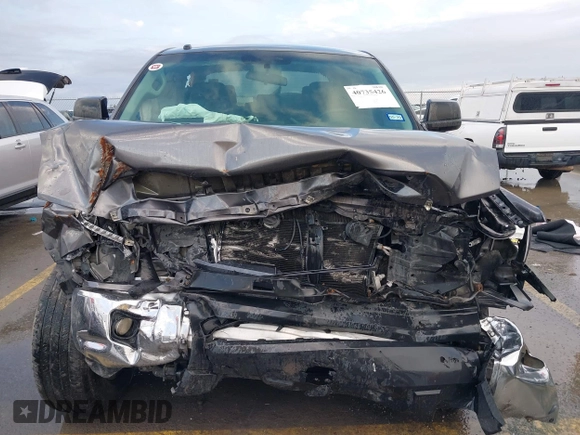2014 Toyota Tundra SR5 z VIN 5TFEM5F16EX082421, wystawiony jako IAAI lot #40735426 z przebiegiem 173 005 mil mil oraz . Historia ofert i sprzedaży dostępna na DreamBid. Obrazek 6.