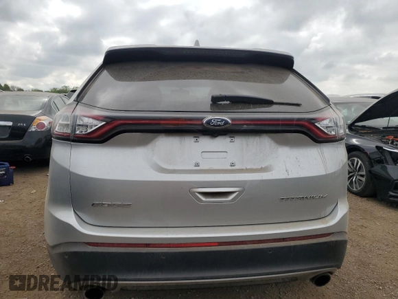 2015 Ford Edge Titanium z VIN 2FMTK4K9XFBB56155, wystawiony jako Copart lot #56735555 z przebiegiem 86 167 mil mil oraz Szkoda całkowita • Salvage title. Historia ofert i sprzedaży dostępna na DreamBid. Obrazek 6.