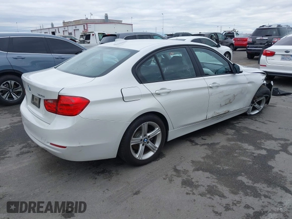 2015 BMW 3 Series 320i with VIN WBA3B1C5XFK137171, listed as a IAAI auction lot 41736278 with 28,673 mi miles. Bid and sale history available at carsss.com. Image 4.