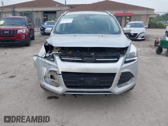 2013 Ford Escape Titanium with VIN 1FMCU9J97DUD16072, listed as a IAAI auction lot 42445993 with 111,255 mi miles and . Bid and sale history available at DreamBid. Image 6.