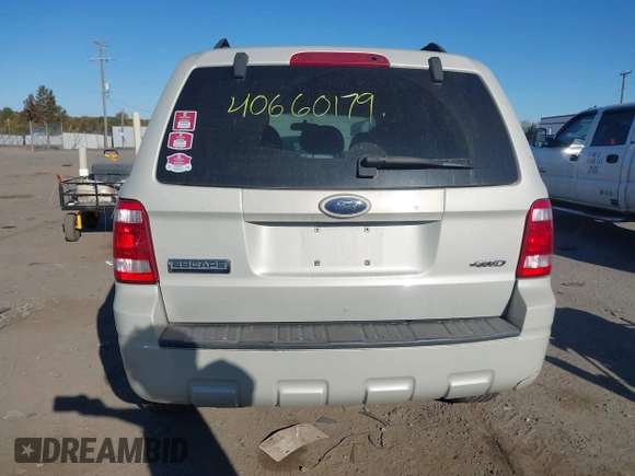 2008 Ford Escape XLT with VIN 1FMCU93158KA39754, listed as a IAAI auction lot 40660179 with 113,956 mi miles. Bid and sale history available at carsss.com. Image 16.