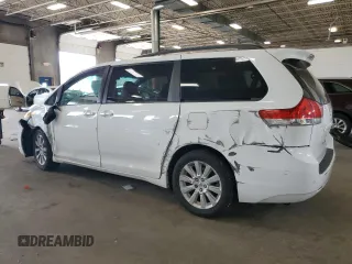 2013 Toyota Sienna XLE with VIN 5TDDK3DC9DS070424, listed as a Copart auction lot 61406715 with 193,583 mi miles and Salvage title. Bid and sale history available at DreamBid. Image 2.