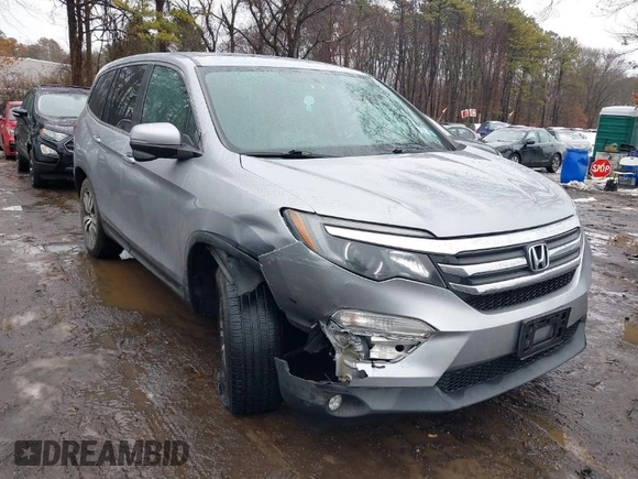 2017 Honda Pilot EX-L with VIN 5FNYF6H51HB069068, listed as a IAAI auction lot 41567728 with 100,618 mi miles and . Bid and sale history available at DreamBid. Image 1.