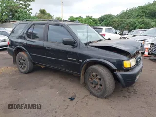 1999 Honda Passport LX z VIN 4S6CM58W0X4417597, wystawiony jako IAAI lot #41075075 z przebiegiem 163 369 mil mil oraz . Historia ofert i sprzedaży dostępna na DreamBid. Obrazek 1.