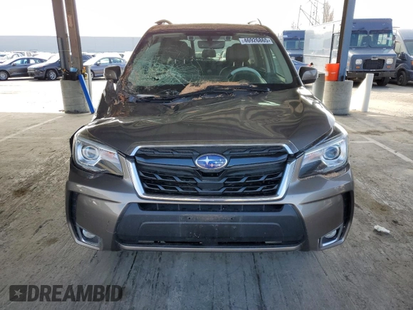 2018 Subaru Forester Touring with VIN JF2SJGWC0JH606547, listed as a Copart auction lot 46926865 with 31,721 mi miles and Salvage Title. Bid and sale history available at carsss.com. Image 5.