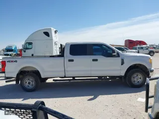 2017 Ford Super Duty F-250 SRW Lariat with VIN 1FT7W2B69HEE73405, listed as a IAAI auction lot 41689288 with 141,595 mi miles. Bid and sale history available at carsss.com. Image 13.