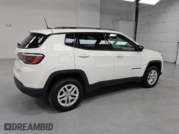 2018 Jeep Compass Sport z VIN 3C4NJDAB1JT306171, wystawiony jako Copart lot #55169745 z przebiegiem 54 489 mil mil oraz Czysty tytuł • Clean title. Historia ofert i sprzedaży dostępna na DreamBid. Obrazek 3.