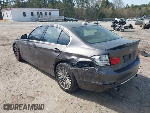 2013 BMW 3 Series 335i with VIN WBA3A9C51DF476537, listed as a IAAI auction lot 41900742 with 184,094 mi miles and . Bid and sale history available at DreamBid. Image 3.