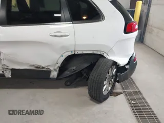 2014 Jeep Cherokee Limited with VIN 1C4PJMDS1EW235980, listed as a IAAI auction lot 41994044 with 128,292 mi miles and . Bid and sale history available at DreamBid. Image 6.