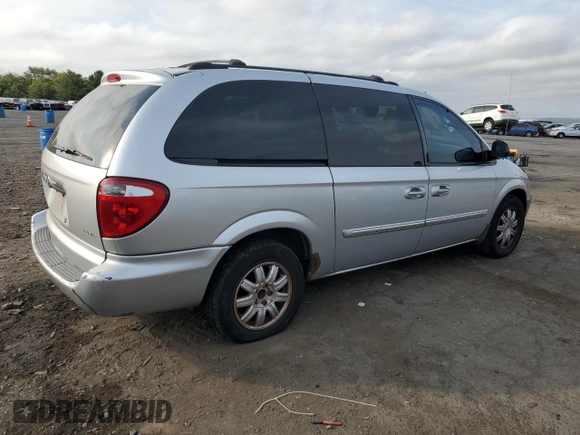 2004 Chrysler Town & Country Touring with VIN 2C4GP54L64R591488, listed as a Copart auction lot 71757554 with 169,116 mi miles and Salvage Title. Bid and sale history available at DreamBid. Image 3.