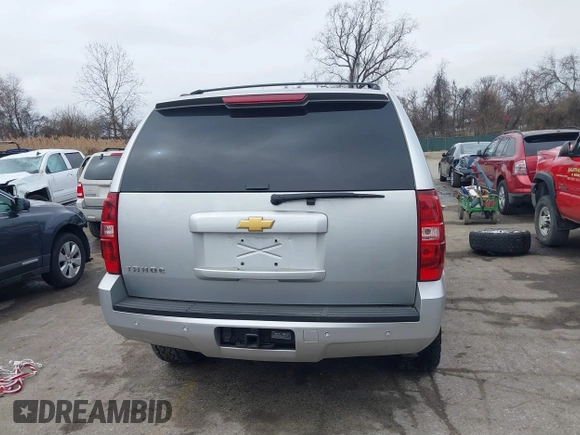 2013 Chevrolet Tahoe LT z VIN 1GNSKBE08DR166024, wystawiony jako IAAI lot #41768851 z przebiegiem 198 302 mil mil oraz . Historia ofert i sprzedaży dostępna na DreamBid. Obrazek 17.