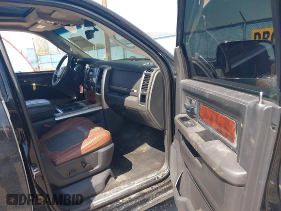 2012 Ram 2500 Laramie Longhorn with VIN 3C6UD5GL8CG182590, listed as a IAAI auction lot 42135638 with 232,377 mi miles and . Bid and sale history available at DreamBid. Image 5.