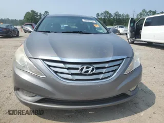 2013 Hyundai Sonata SE z VIN 5NPEC4AC2DH557370, wystawiony jako Copart lot #59120895 z przebiegiem 180 932 mil mil oraz Szkoda całkowita • Salvage title. Historia ofert i sprzedaży dostępna na DreamBid. Obrazek 5.