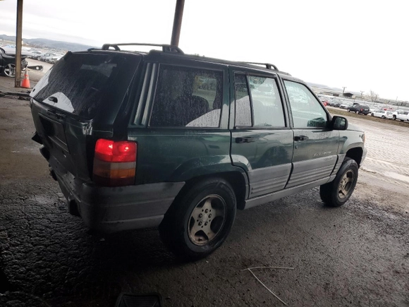 1997 Jeep Grand Cherokee TSi with VIN 1J4FX58S6VC602782, listed as a Copart auction lot 86605074 with 158,971 mi miles and Salvage Title. Bid and sale history available at carsss.com. Image 3.