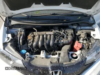 2016 Honda Fit LX z VIN JHMGK5H57GX045796, wystawiony jako Copart lot #59555545 z przebiegiem 94 235 mil mil oraz Szkoda całkowita • Salvage title. Historia ofert i sprzedaży dostępna na DreamBid. Obrazek 11.