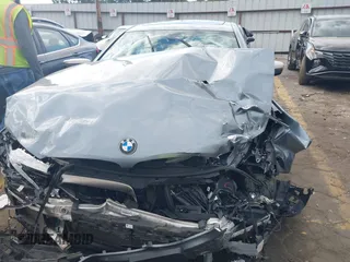 2018 BMW 5 Series M550i xDrive with VIN WBAJB9C53JB286035, listed as a IAAI auction lot 40590380 with 57,072 mi miles and . Bid and sale history available at carsss.com. Image 12.