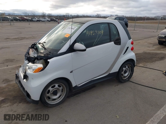 2013 Smart fortwo Pure with VIN WMEEJ3BA2DK702004, listed as a IAAI auction lot 41829808 with 53,545 mi miles and . Bid and sale history available at DreamBid. Image 18.