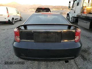 2004 Toyota Celica GT with VIN JTDDR32T040168744, listed as a Copart auction lot 85504754 with 210,919 mi miles and Clean Title. Bid and sale history available at DreamBid. Image 6.