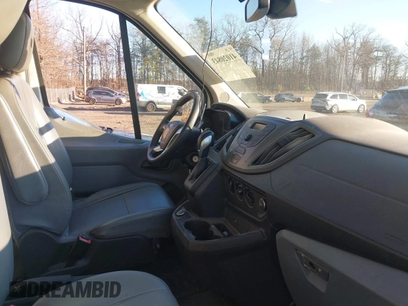 2019 Ford Transit with VIN 1FTYE1CM6KKA74930, listed as a IAAI auction lot 41020843 with 104,218 mi miles and . Bid and sale history available at DreamBid. Image 5.