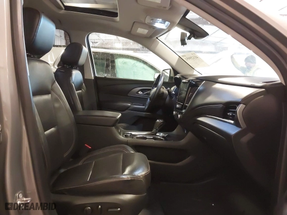 2018 Chevrolet Traverse Premier with VIN 1GNEVJKW0JJ165144, listed as a IAAI auction lot 41129951 with 137,593 mi miles. Bid and sale history available at carsss.com. Image 5.