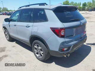 2022 Honda Passport TrailSport with VIN 5FNYF8H6XNB023013, listed as a IAAI auction lot 42274071 with 31,471 mi miles and . Bid and sale history available at DreamBid. Image 3.