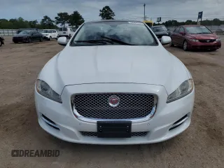 2015 Jaguar XJ with VIN SAJWA1CZ9F8V82974, listed as a Copart auction lot 59364344 with 64,012 mi miles and Salvage Title. Bid and sale history available at carsss.com. Image 5.