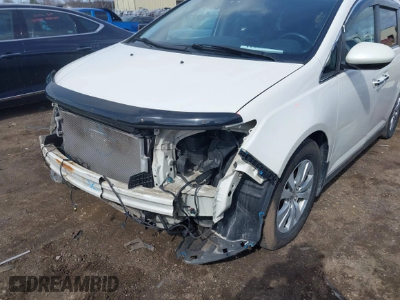 2014 Honda Odyssey EX-L with VIN 5FNRL5H63EB136541, listed as a IAAI auction lot 41866320 with 148,696 mi miles and . Bid and sale history available at DreamBid. Image 6.