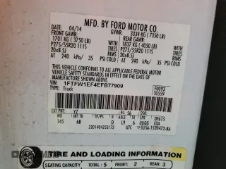 2014 Ford F-150 XL with VIN 1FTFW1EF4EFB77909, listed as a Copart auction lot 60409575 with 201,434 mi miles and Salvage title. Bid and sale history available at DreamBid. Image 12.