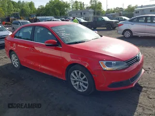 2014 Volkswagen Jetta SE z VIN 3VWD17AJ7EM303390, wystawiony jako IAAI lot #42342049 z przebiegiem 103 763 mil mil oraz . Historia ofert i sprzedaży dostępna na DreamBid. Obrazek 1.