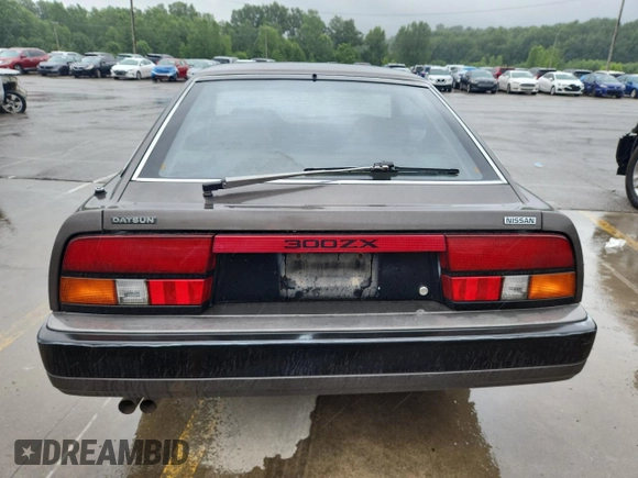 1984 Nissan 300ZX z VIN JN1HZ14S4EX005200, wystawiony jako Copart lot #61509385 z przebiegiem 190 583 mil mil oraz Czysty tytuł • Clean title. Historia ofert i sprzedaży dostępna na DreamBid. Obrazek 6.