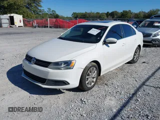 2013 Volkswagen Jetta SE with VIN 3VWDX7AJ0DM397061, listed as a IAAI auction lot 41237703 with 114,704 mi miles and . Bid and sale history available at DreamBid. Image 2.