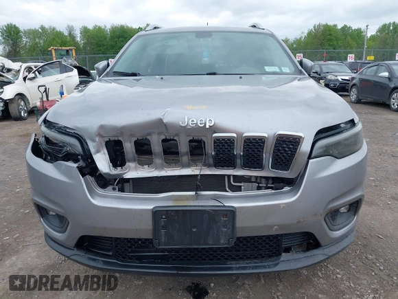2019 Jeep Cherokee Latitude Plus z VIN 1C4PJMLB9KD287978, wystawiony jako IAAI lot #42228505 z przebiegiem 207 539 mil mil oraz . Historia ofert i sprzedaży dostępna na DreamBid. Obrazek 6.
