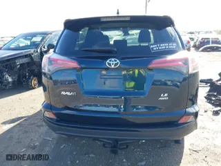 2018 Toyota RAV4 LE with VIN JTMBFREV1JJ743018, listed as a IAAI auction lot 41974309 with 59,135 mi miles. Bid and sale history available at carsss.com. Image 17.